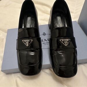 Prada triangle logo loafers